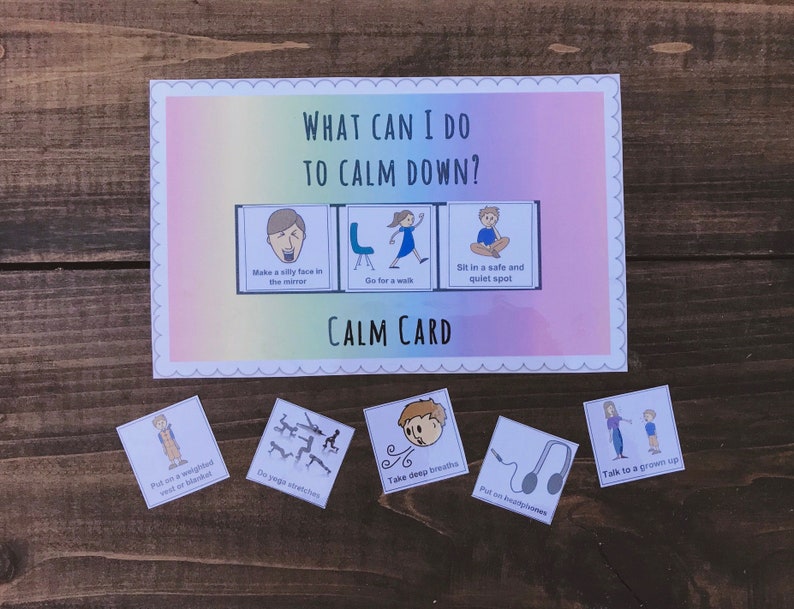 May include: A colorful printable card with the text "What can I do to calm down?" and several illustrated calming techniques, such as making a silly face in the mirror, going for a walk, sitting in a safe and quiet spot, putting on a weighted vest or blanket, doing yoga stretches, taking deep breaths, putting on headphones, and talking to a grown up.