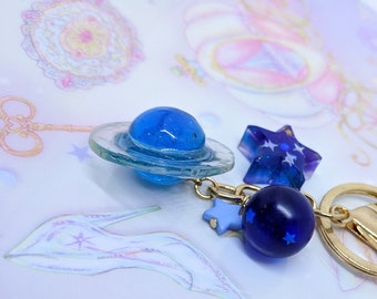 Incantevole resina pianeta saturno portachiavi