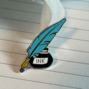 Blue Feather Quill and Ink Pot Enamel Pin Inspirational Quote