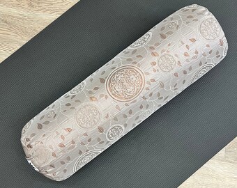 Round Yoga Bolster, Matte Bronze Color with Subtle Exotic Symbol Print, Perfect yoga practice prop to support the body in complete comfort