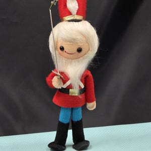 Vintage Toy Soldier Ornament with Sword for Retro Christmas Decor