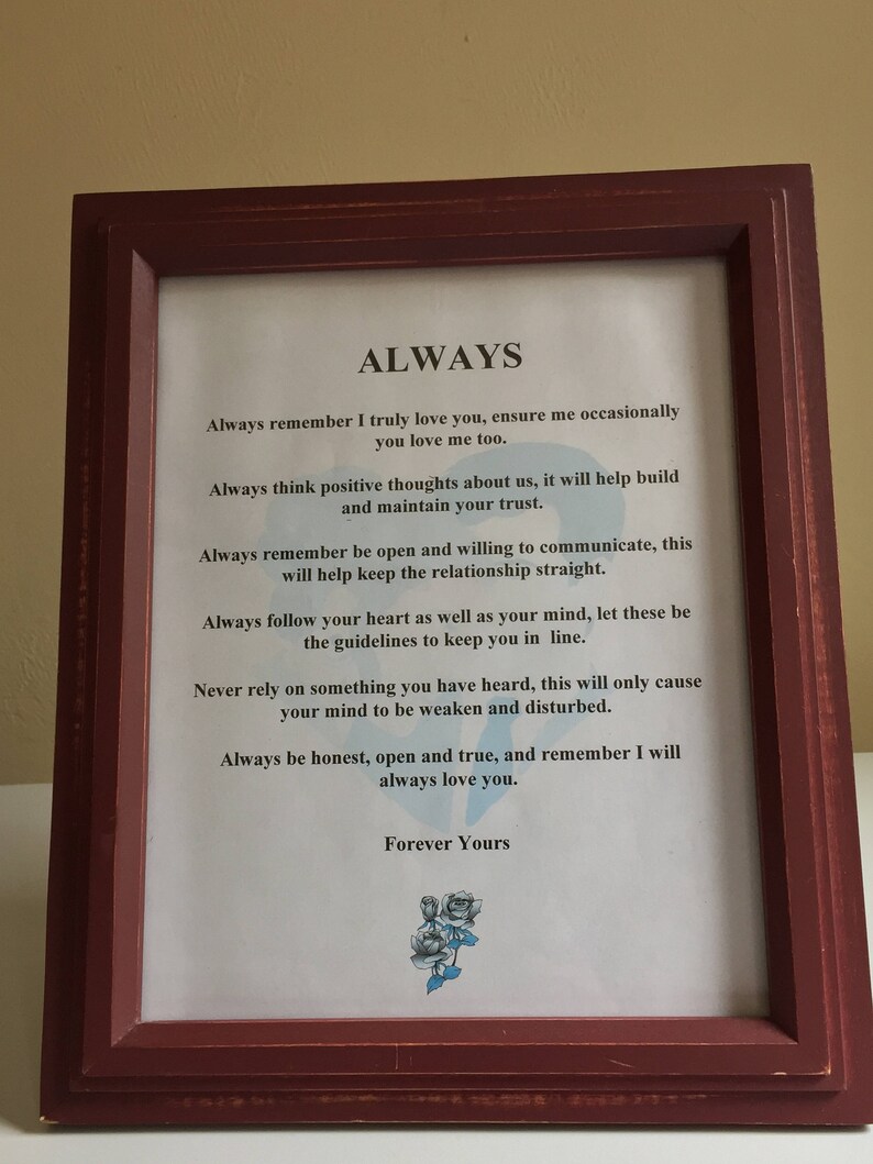 May include: A framed print with a white background and black text that reads "ALWAYS" and includes a list of advice. The text is framed in a dark red wood frame.