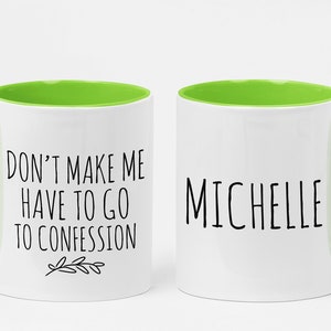May include: White ceramic mug with a bright green interior and handle. One side reads "DON'T MAKE ME HAVE TO GO TO CONFESSION" with a small leaf design. The other side displays the name "MICHELLE" in black text.