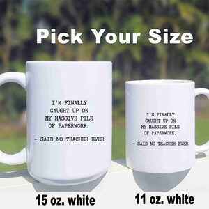 May include: Two white ceramic mugs with a funny saying about teachers and paperwork. The mug on the left is 15 ounces and the mug on the right is 11 ounces.