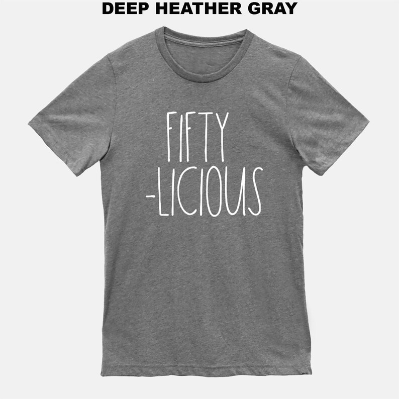 May include: A heather gray t-shirt with the text "FIFTY -LICIOUS" printed in white.