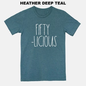 May include: A heather deep teal t-shirt with the text "FIFTY -LICIOUS" in white.