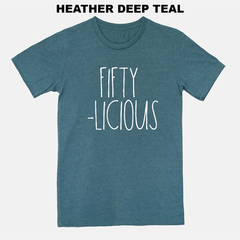 May include: A heather deep teal t-shirt with the text "FIFTY -LICIOUS" in white.
