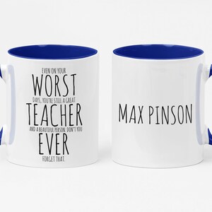 May include: White ceramic mug with a blue interior and handle. One side reads "EVEN ON YOUR WORST DAYS, YOU'RE STILL A GREAT TEACHER AND A BEAUTIFUL PERSON, DON'T YOU EVER FORGET THAT." The other side says "MAX PINSON."