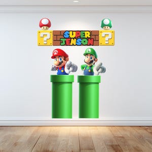 パイプから出てきたスーパーマリオとルイージがあなたを指しています。ブロックに名前が入った子供のゲームルーム装飾壁ビニールグラフィックステッカーです。