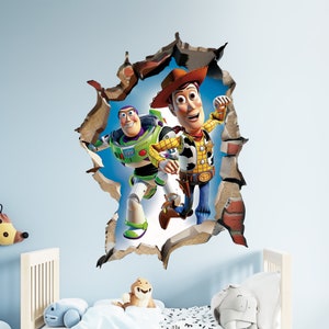 May include: Toy Story characters Woody and Buzz Lightyear are shown breaking through a wall. Woody is wearing his signature cowboy hat and vest, while Buzz is in his space ranger suit. The characters are in a 3D style, giving the impression that they are popping out of the wall.