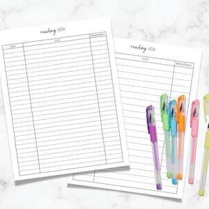 May include: Two white reading log sheets with black lines and the text "reading log". Colorful gel pens in purple, green, orange, pink, and yellow are arranged near the sheets. The sheets have sections for date, title, and minutes/pages.