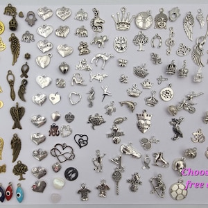 May include: A large selection of silver and gold charm pendants, including hearts, animals, religious symbols, and more. Choose your free charm.