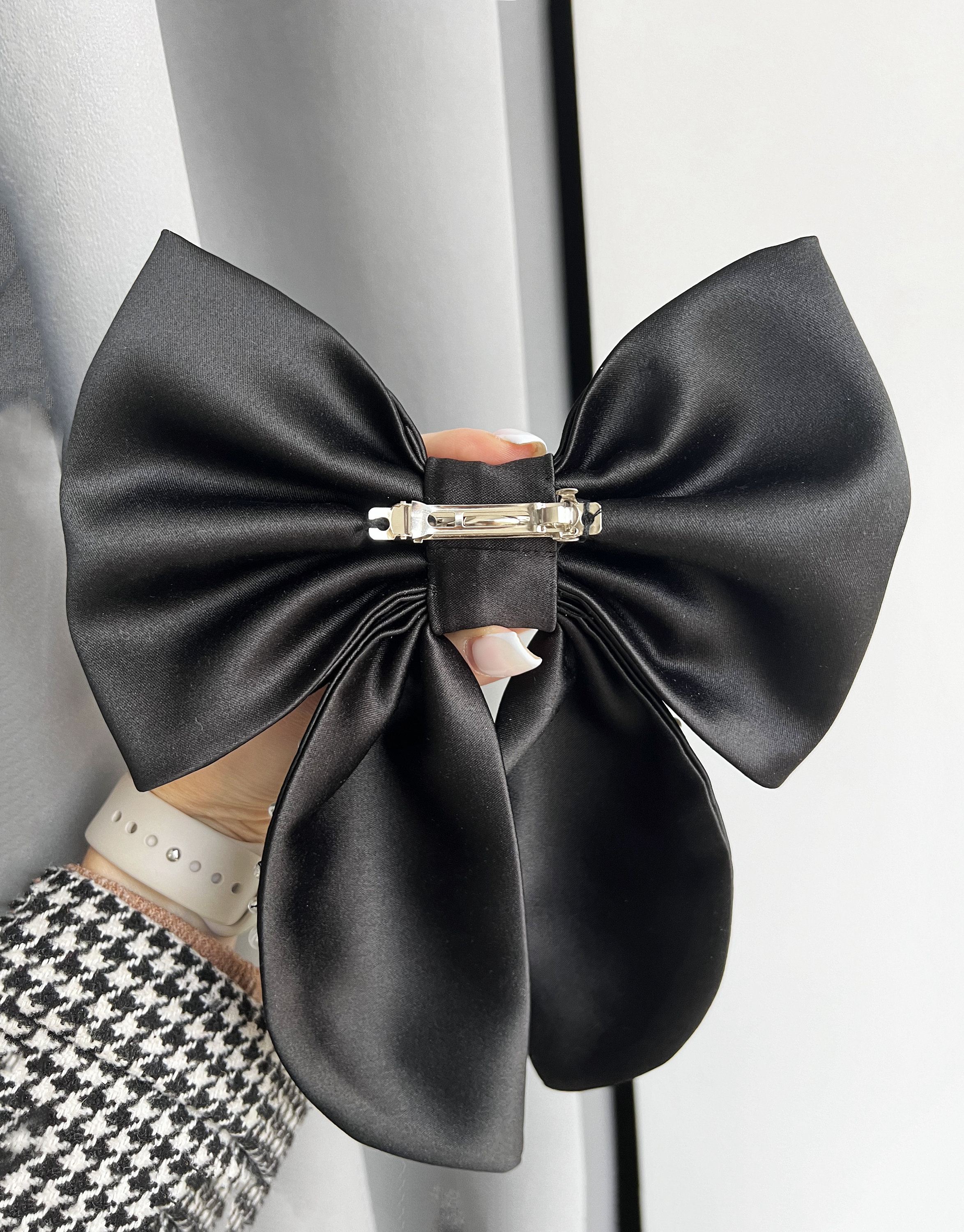 Revolve Lovers and Friends Black Satin Bow Crystals Hair Barette 21 Best Hair Bows to Turn Up the Charm On Any Look 2024 | Allure main image 2