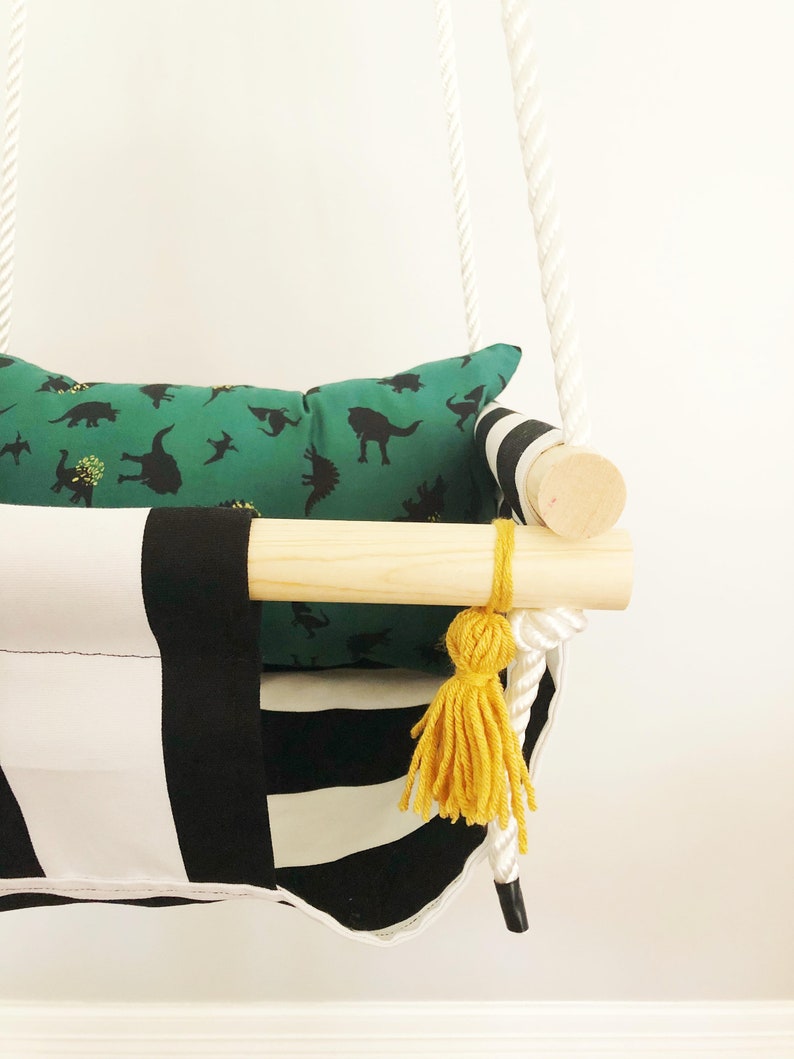 Black And White Baby Swing With Dinosaur Pillow