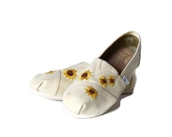 Women's size 7 Sunflower Tom's
