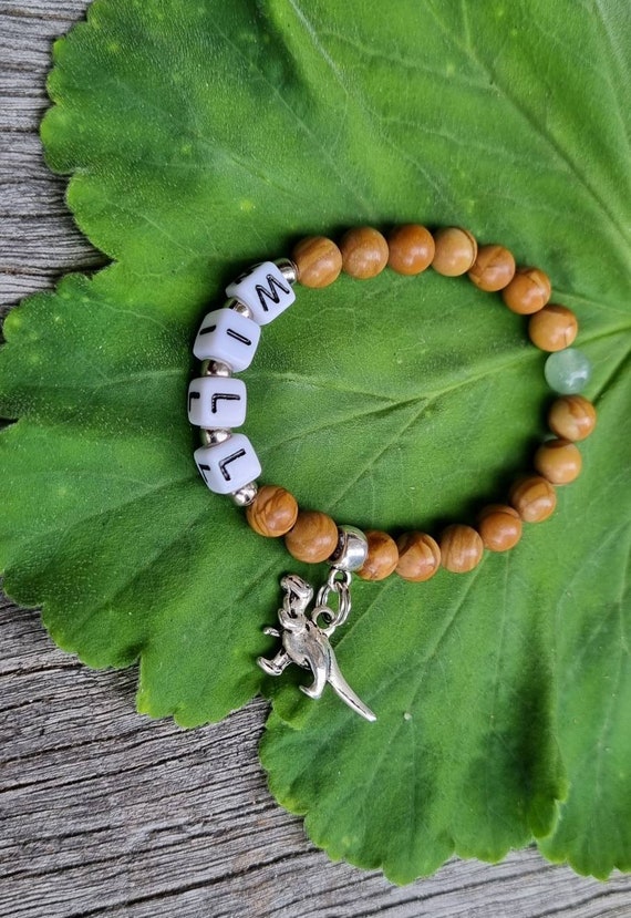 Dinosaur beads for jewelry making discount
