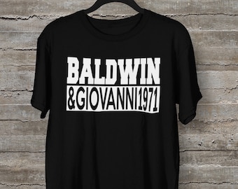 May include: Black t-shirt with white text that reads "BALDWIN & GIOVANNI 1971".