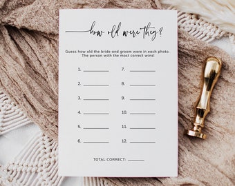 May include: A printable game card with the text "how old were they?" and instructions to guess the ages of the bride and groom in each photo. The card has 12 numbered lines for writing in the guesses and a line for the total number of correct answers.