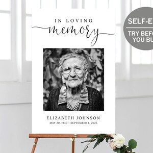 May include: A black and white photo memorial sign with the text "In loving memory" and a photo of an older woman. The text below the photo reads "Elizabeth Johnson May 20, 1930 - September 4, 2025".