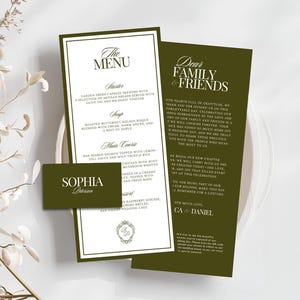 May include: A wedding stationery set featuring a white menu card with dark green borders, a dark green thank you card titled Dear Family & Friends, and a small dark green place card with the name Sophia Peterson in white serif typography.