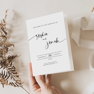 May include: Wedding invitation with a white background and black text. The invitation reads "Welcome to the wedding of Sophia and Jonah" with the date "Saturday, 25 August 2025" and the location "Vista West Ranch, Dripping Springs, TX".