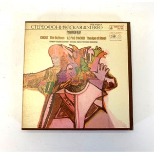 May include: A vintage record album cover featuring an abstract, colourful illustration of a person with multiple hands. The album is titled "Prokofiev Ballet Suites Chout The Buffoon Le Pas D'Acier The Age of Steel" and features the text "Gennady Rozhdestvensky Moscow Radio Symphony Orchestra".
