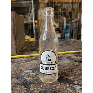 Vintage Squeeze 10 oz Soda Bottle National Fruit Flavor Company Nowy Orlean USA Lata 40. XX wieku