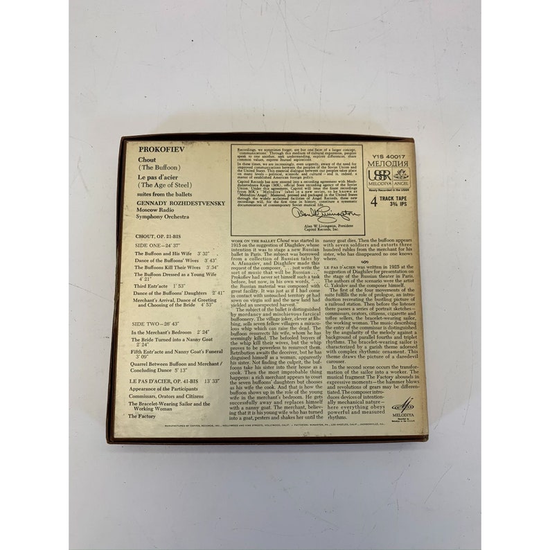 May include: A vintage record album cover featuring a colourful illustration of a clown with a red nose and a blue and white costume. The album is titled "Prokofiev Chout (The Buffoon)" and features the Moscow Radio Symphony Orchestra. The album is a 4-track tape and is part of the Melodiya label.