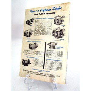 May include: A vintage advertisement for Craftsman grinders, featuring a variety of models with different horsepower ratings. The ad highlights the different uses for each grinder, including polishing, grinding, and belt-driven applications. The ad also includes a section on grinding accessories.