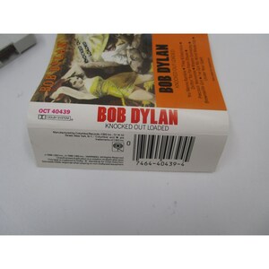 Cassette « Knocked Out Loaded » de Bob Dylan avec étui et carte J-Card 1986 Columbia Records vintage de collection