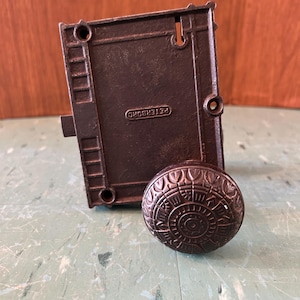 May include: A set of three ceramic mugs with a speckled, matte finish in cream, light grey, and dark grey. Each mug has a simple, minimalist design and a rounded handle.