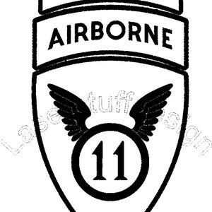 May include: Black and white graphic of a military patch with the words "ARCTIC AIRBORNE" and the number "11" inside a circle with wings.