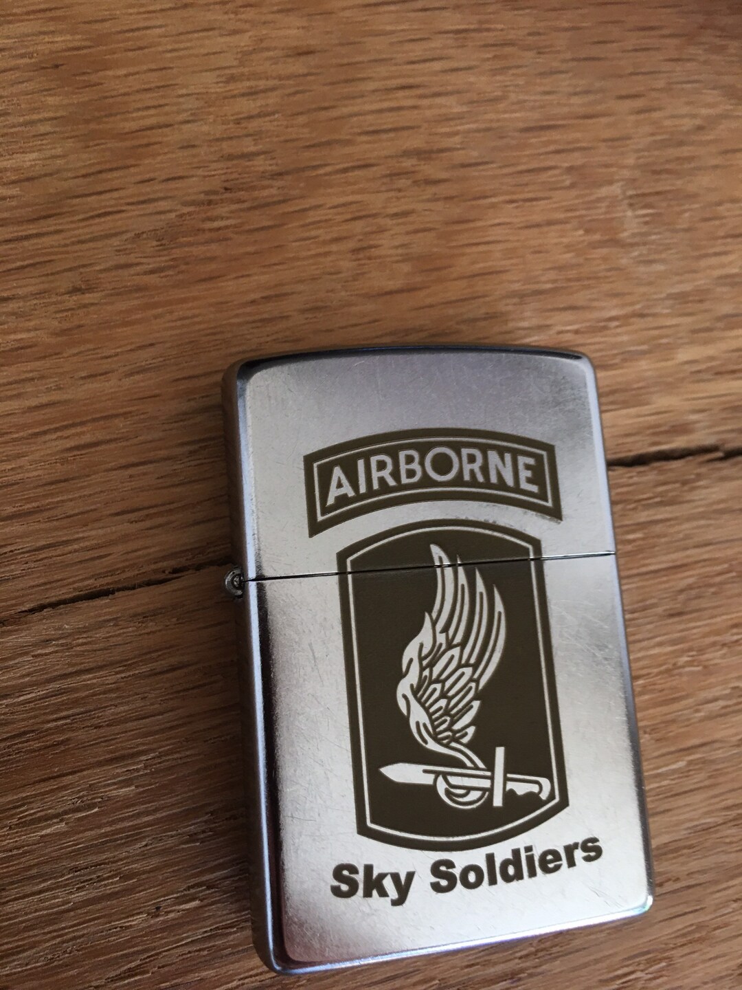 Lot - 4 WWII Zippo lighters US Paratrooper/82d Airborne