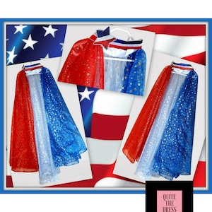 May include: A red, white, and blue cape with gold glitter stars. The cape is made of tulle and has a red, white, and blue ribbon trim. The cape is shown on a hanger with a matching headband with a star on top. The headband is also trimmed with a red, white, and blue ribbon. The image also includes the text "QUITE THE DRESS".