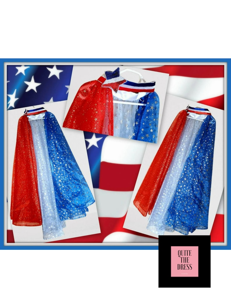 May include: A red, white, and blue cape with gold glitter stars. The cape is made of tulle and has a red, white, and blue ribbon trim. The cape is shown on a hanger with a matching headband with a star on top. The headband is also trimmed with a red, white, and blue ribbon. The image also includes the text "QUITE THE DRESS".