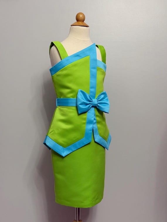 neon green peplum dress Angel Couture neon green and baby pink peplum dress is a hot seller in no time. Our personal favourite colour combination is a love at first sight. With glittering straps and flowers