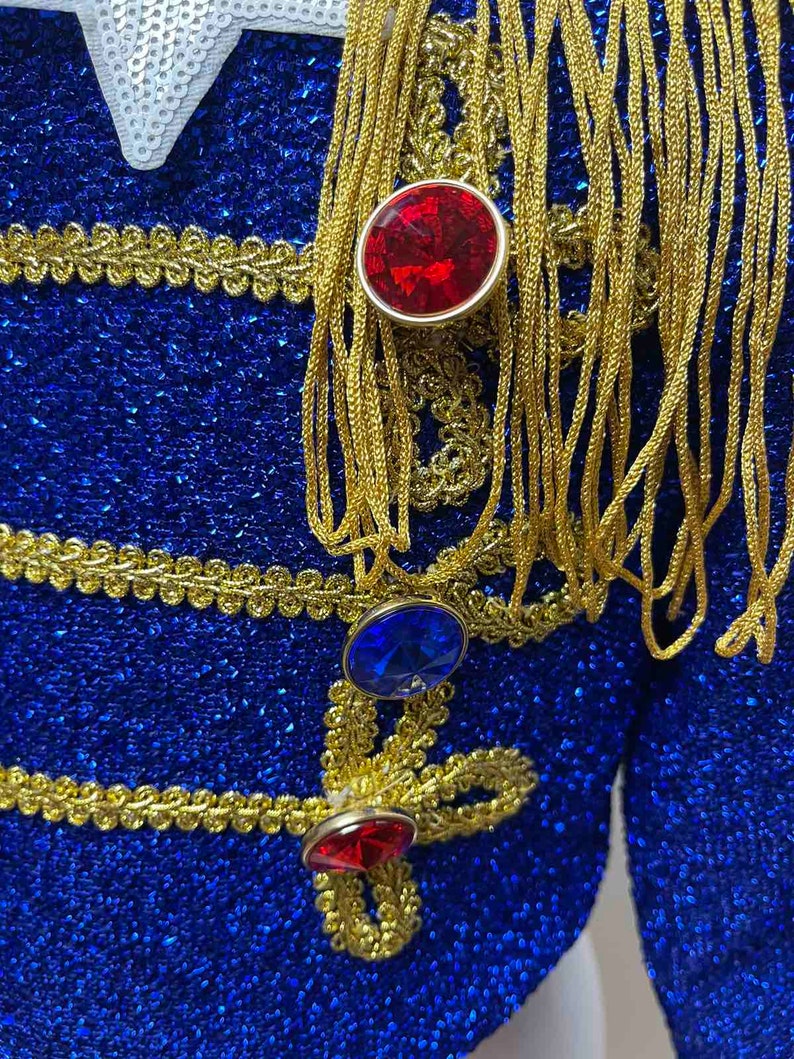 May include: A blue sequined jacket with gold trim and red and blue jeweled buttons.