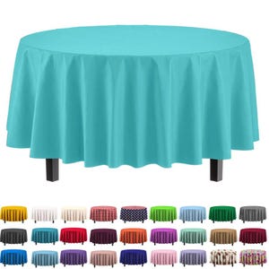 May include: A round, turquoise tablecloth draped over a table with black legs. The image also shows a variety of other round tablecloths in different colors and patterns, including white, red, and polka dots.