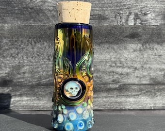 Tarro de cristal con forma de calavera