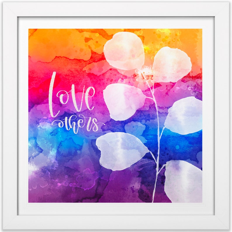 May include: A watercolor painting with a rainbow gradient background and a white silhouette of a branch with leaves. The text "love others" is written in white cursive lettering.