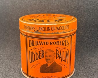 Vintage Mid Century Dr. David Roberts Udder Balm advertising tin with portrait