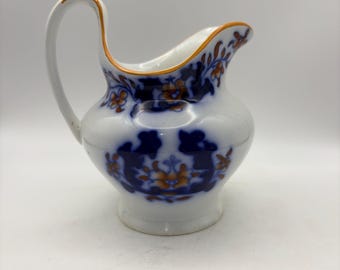 Jarra de crema Minton inglesa de finales del siglo XIX, color azul cobalto con estampado floral naranja.