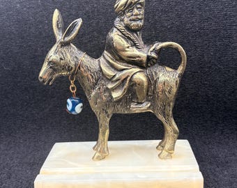 Vintage brass Nasreddin Hodja figurine riding a donkey backwards on marble base