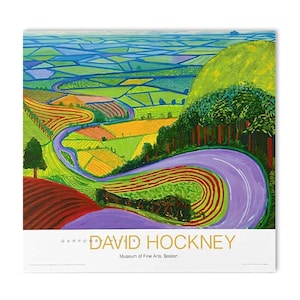 May include: A vibrant landscape print depicting a winding road through fields and hills. The artwork, by David Hockney, uses bright greens, yellows, and purples. The print includes the text "DAVID HOCKNEY" and "Museum of Fine Arts, Boston".