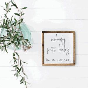 Nobody puts baby in the corner wood framed sign