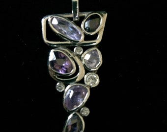 Amethyst and cz sterling silver pendant asymmetrical triangular shape marked KC 925