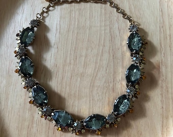 Florenza goldtone bib necklace. Statement piece with givre grey blue rhinestones vintage