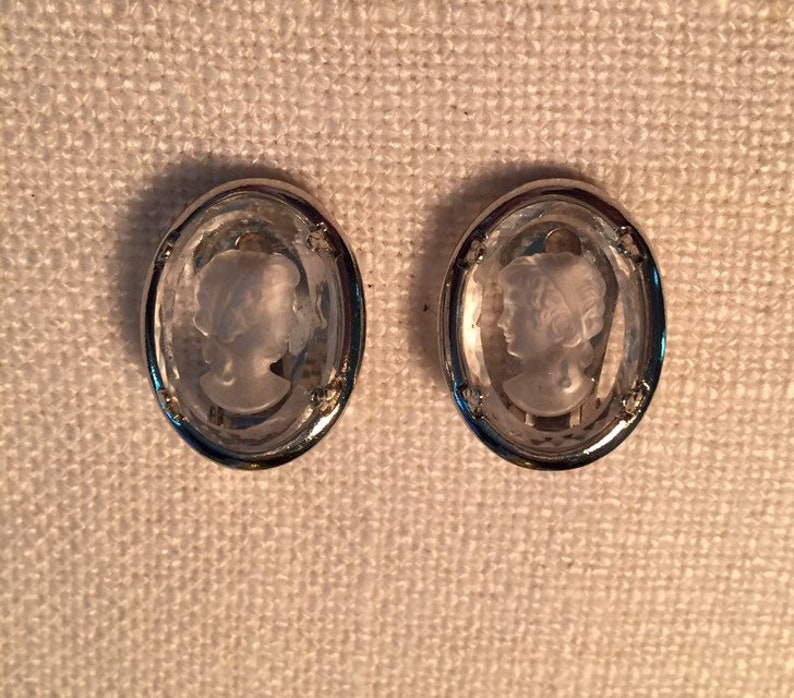 Vintage silvertone Joseph Warner intaglio crystal clip earrings