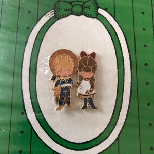 Joan Walsh Anglund boy and girl cloisonné pin original packaging