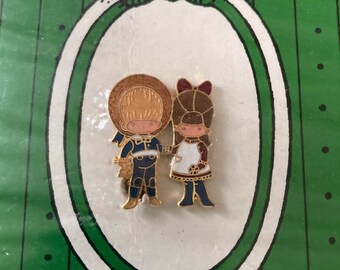 Joan Walsh Anglund boy and girl cloisonné pin original packaging